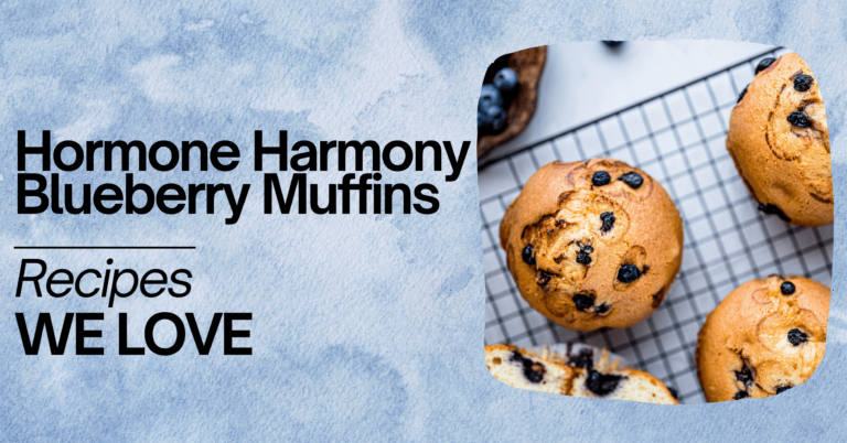 A visually appealing image featuring 'Hormone Harmony Blueberry Muffins' with the text 'Recipes WE LOVE' in bold black letters on a light blue watercolor background. On the right side, there’s a photo of freshly baked blueberry muffins with visible blueberries, cooling on a wire rack, presented in a circular frame. The muffins have a golden-brown top with some blueberries peeking out, creating a tempting and delicious look.