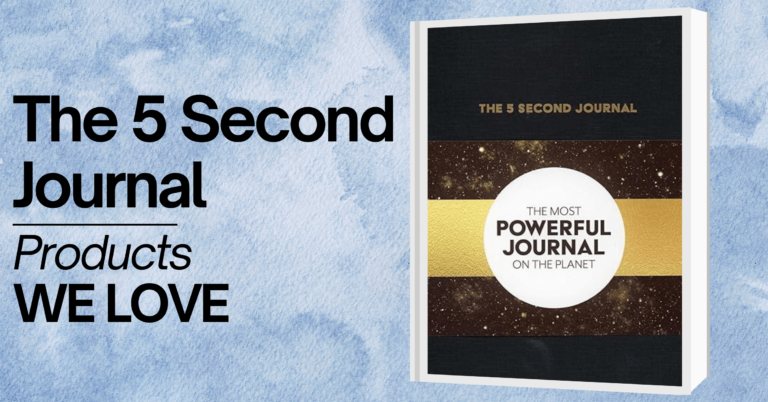 A promotional image featuring 'The 5 Second Journal' book on a light blue watercolor background. The book has a black cover with a starry design, a gold band, and a white circle with the text 'The Most Powerful Journal on the Planet' in black. The text on the left side of the image reads 'The 5 Second Journal' in large black letters, followed by 'Products WE LOVE' in smaller black letters.