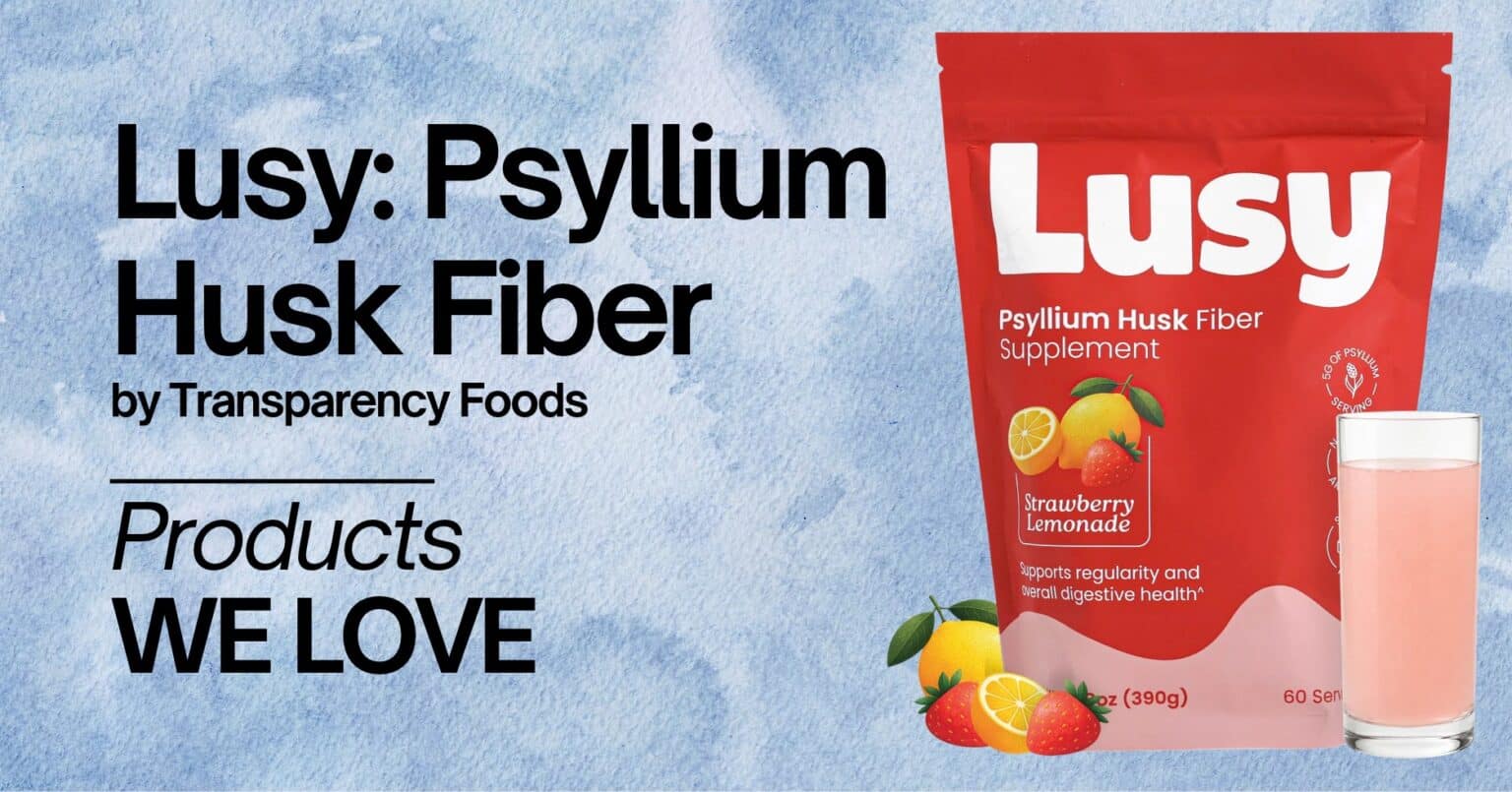 Products We Love: Lusy Psyllium Husk Fiber by Transparency Foods — red pouch of Strawberry Lemonade psyllium husk fiber supplement next to a glass of the prepared pink drink